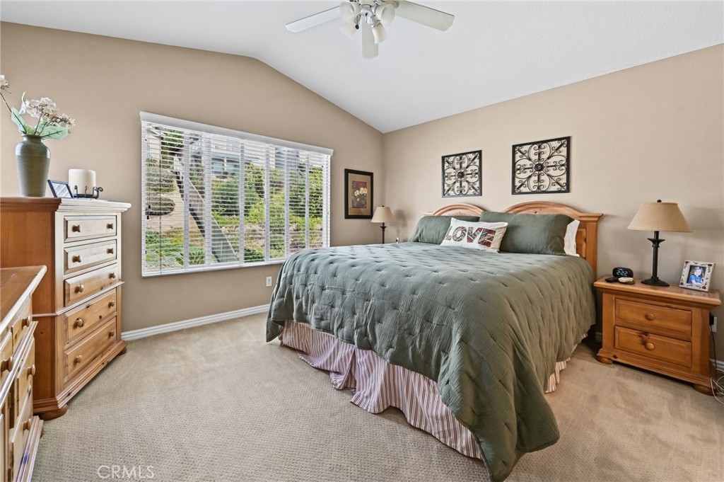 Primary Bedroom has a gorgeous view of the backyard Pool - 1028 S Brianna Way, Anaheim CA 92808 - photo 31