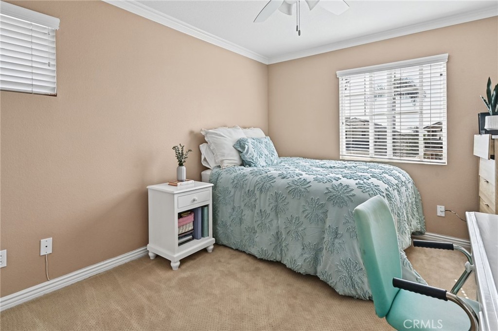 Bedroom #2 has crown moulding - 1028 S Brianna Way, Anaheim CA 92808 - photo 35