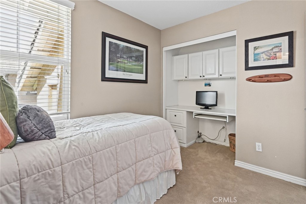 Bedroom #3 has a built in desk in the closet. The owners have the closet door, so it could be converted back to a tradit - 1028 S Brianna Way, Anaheim CA 92808 - photo 38
