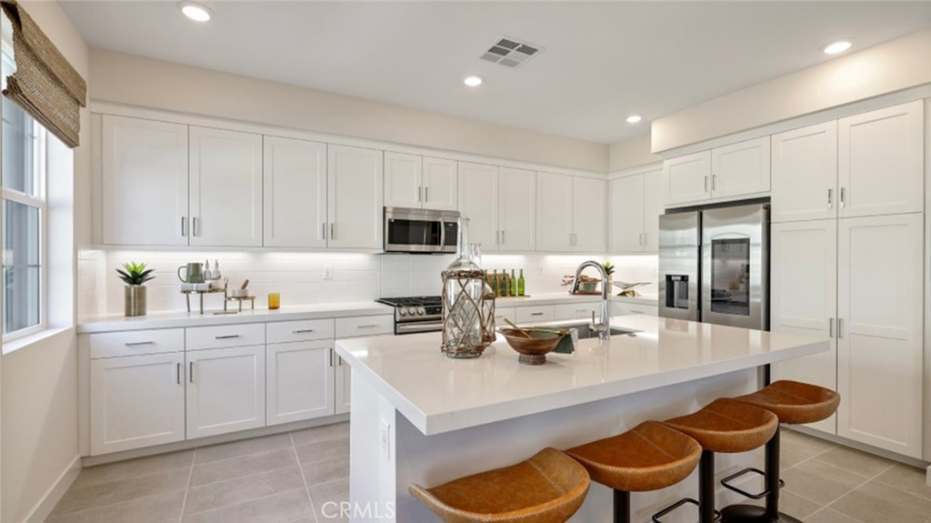 Photos shown are of model only- not actual homesite. - 1044 N Anaheim Boulevard 1, Anaheim CA 92801 - photo 1