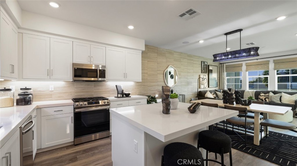 Photos shown are of model only- not actual homesite. - 1074 N Anaheim Boulevard 3, Anaheim CA 92801 - photo 1