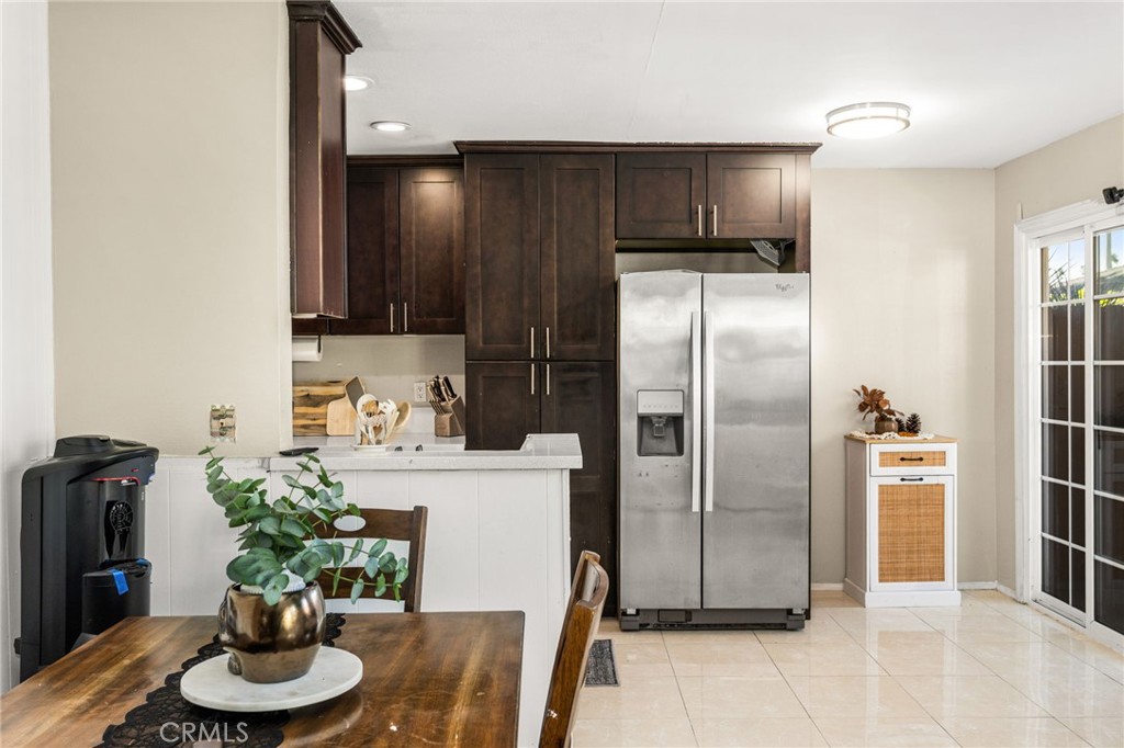 Open dining and kitchen area - 134 S Magnolia Avenue 2C, Anaheim CA 92804 - photo 10
