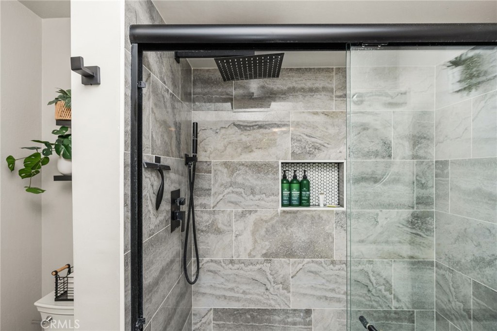 Main bath, updated walk-in shower. - 134 S Magnolia Avenue 2C, Anaheim CA 92804 - photo 22
