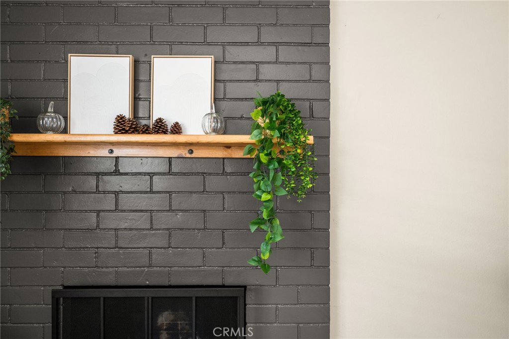 Cozy fireplace in family room - 134 S Magnolia Avenue 2C, Anaheim CA 92804 - photo 25