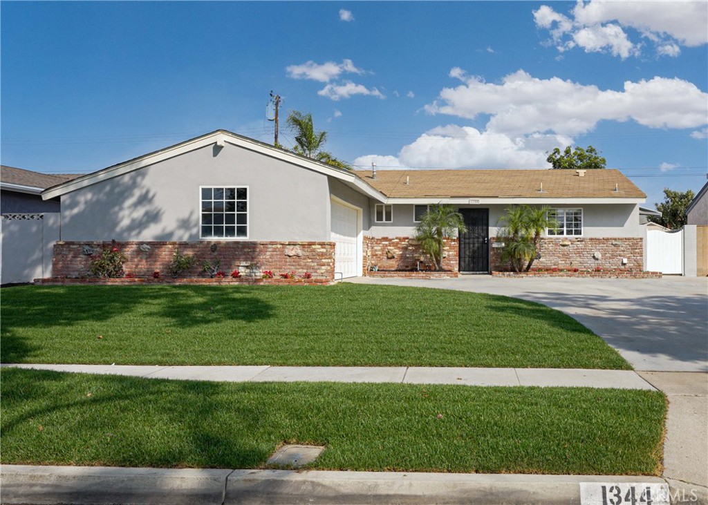 Nicely upgraded, single story, 3 bedroom, 1.5 bath home on a large interior tract lot in West Anaheim! - 1344 S Berkley Street, Anaheim CA 92804 - photo 1