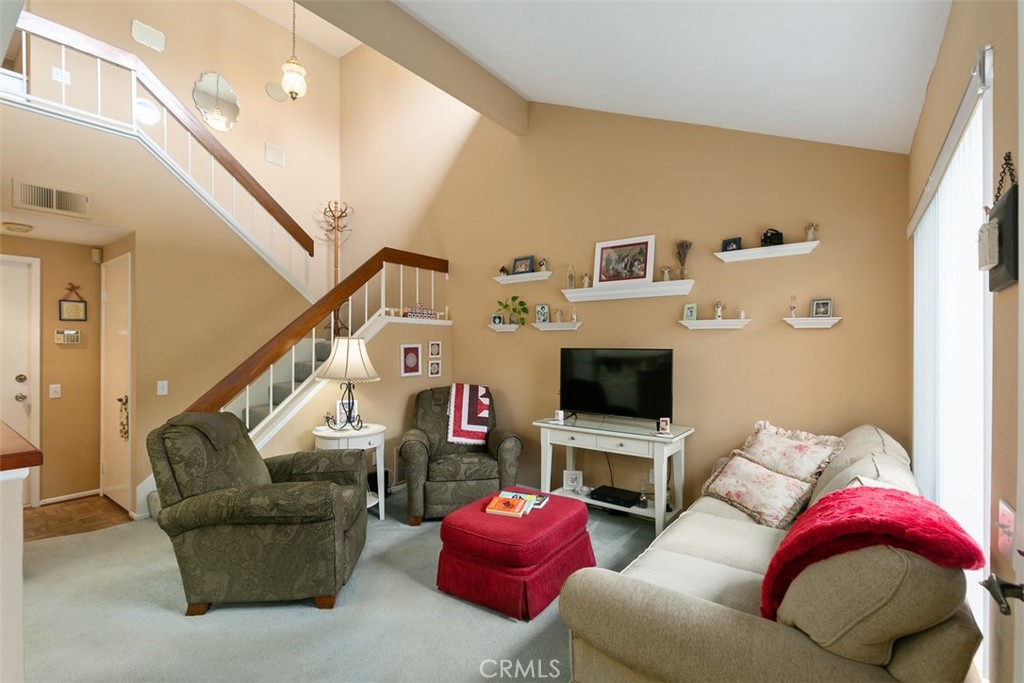 Light & Bright living area with vaulted ceilings - 1363 N Schooner Lane 99, Anaheim CA 92801 - photo 1