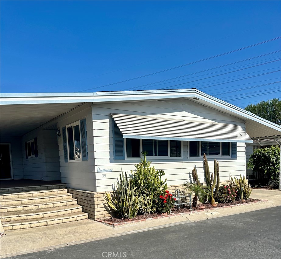 Front of this beauty with low maintenance foliage - 1400 S Sunkist 39, Anaheim CA 92806 - photo 1