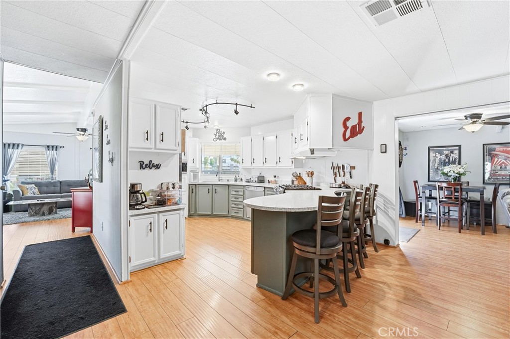 Super cute kitchen!! Window overlooking front patio. Perfect for bbq's and pass through. - 1400 S Sunkist 48, Anaheim CA 92806 - photo 1