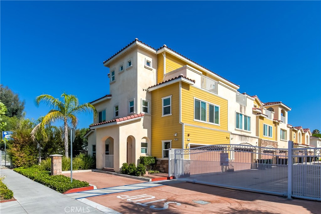 Gated Community with 1 Parking Space in Front of Townhouse - 1544 W Katella Avenue 8, Anaheim CA 92802 - photo 1