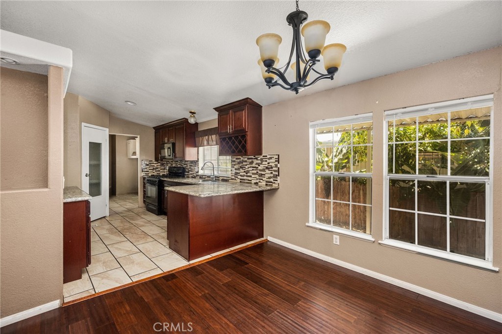 Dining area looking into kitchen - 1616 S Euclid 71, Anaheim CA 92802 - photo 9