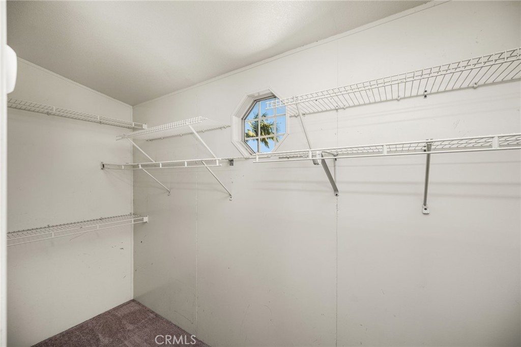 Primary Bedroom Closet - 1616 S Euclid 71, Anaheim CA 92802 - photo 23