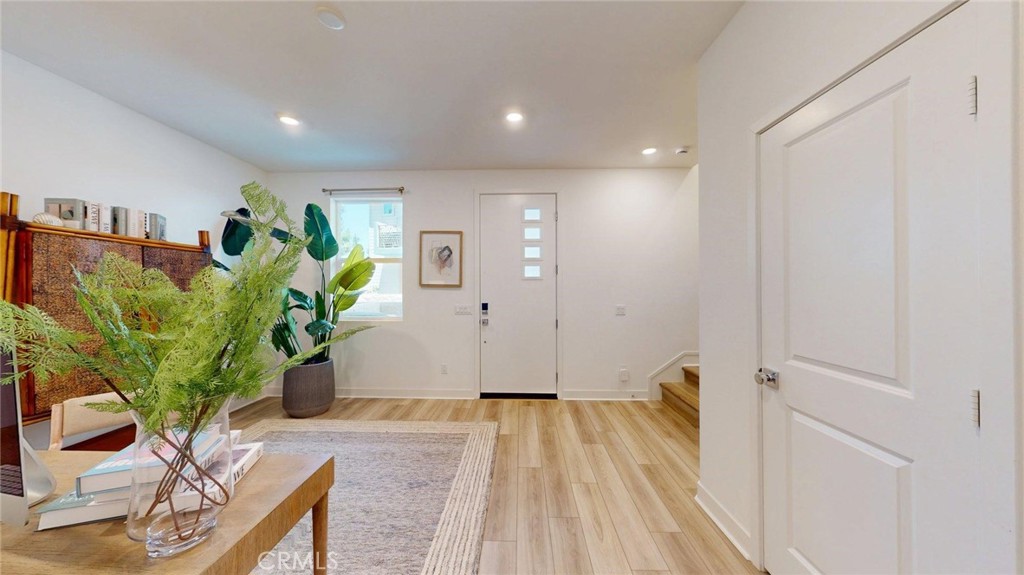 1st level looking at the front entry door - 1673 W. Lincoln Avenue 102, Anaheim CA 92801 - photo 1