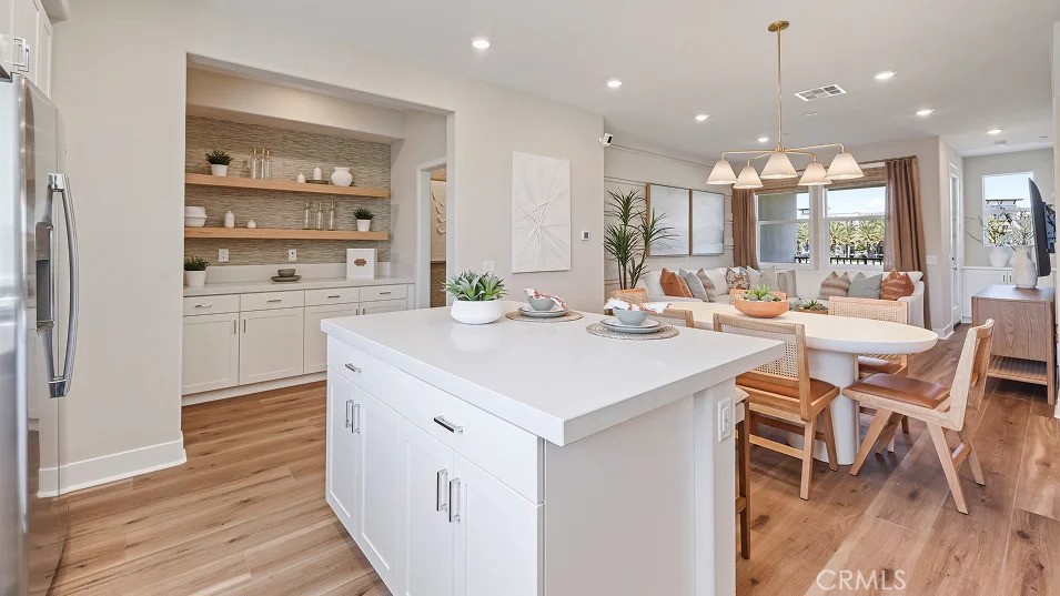 Photos shown are of model only- not actual homesite. - 1720 E Park Street 11, Anaheim CA 92805 - photo 1