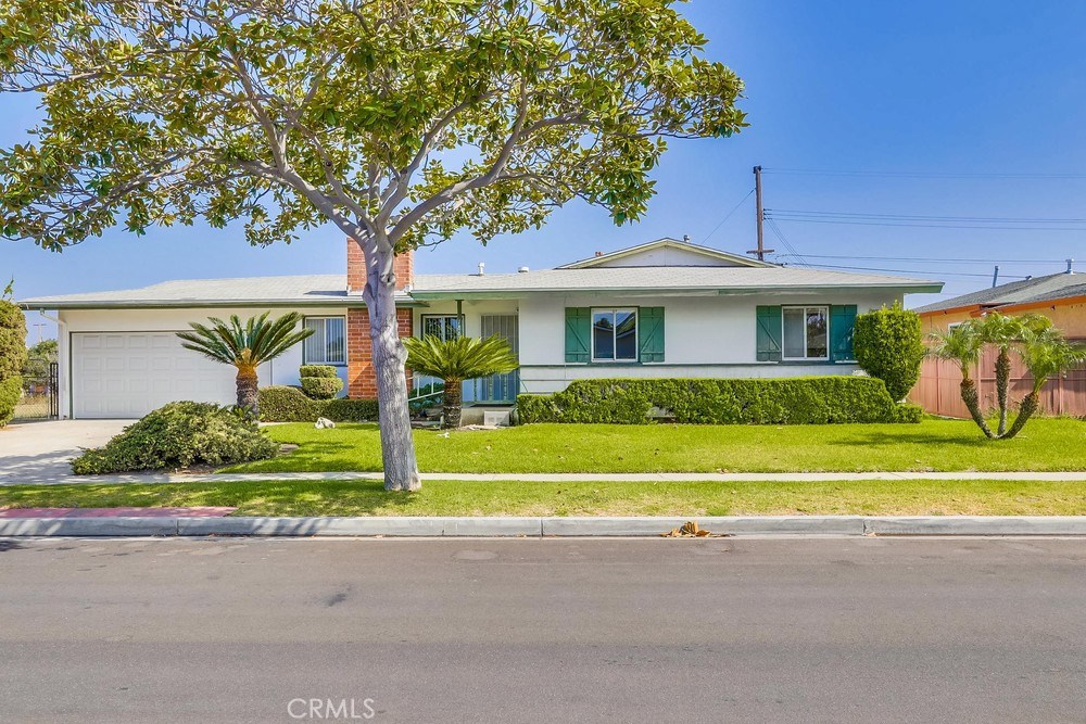 nice curb appeal on tree-lined street - 1867 W Cris Avenue, Anaheim CA 92804 - photo 1