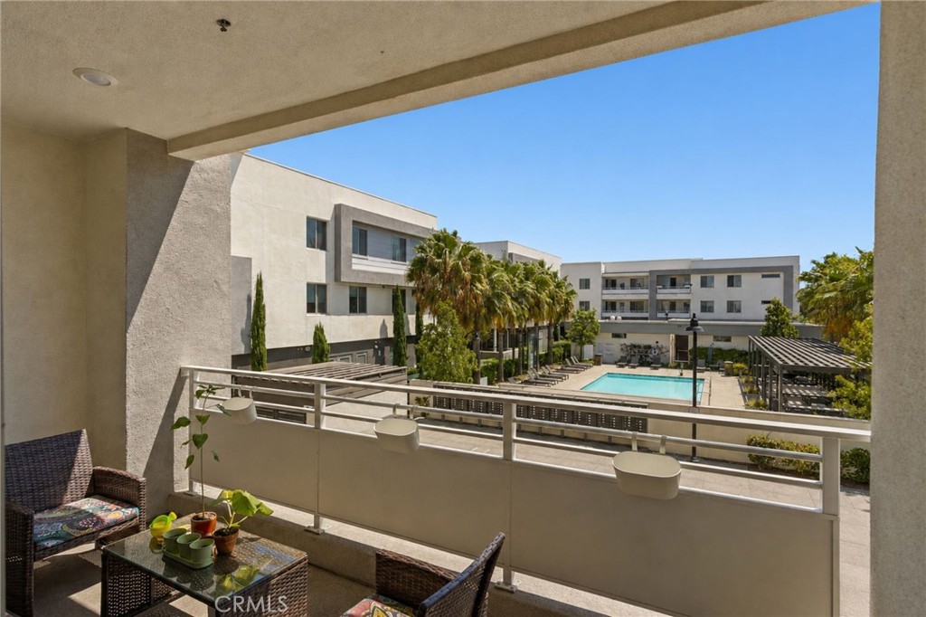 Private Balcony with view to pool - 1871 S Union 81, Anaheim CA 92805 - photo 1
