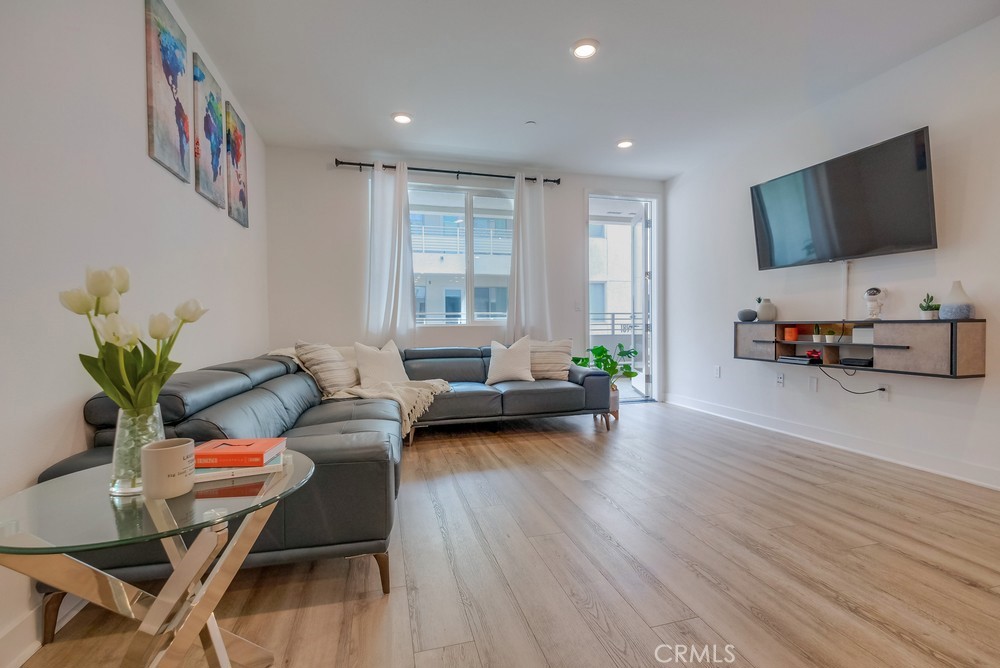 Large open living area, open floor plan - 1897 S Union Street 128, Anaheim CA 92805 - photo 1