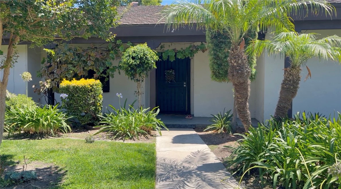 Front Entry Pathway with Spacious Porch and entry area. - 2011 W Katella 2, Anaheim CA 92804 - photo 1