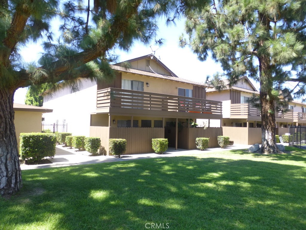 Rear units inside the gated common area - 2134 S Acama Street, Anaheim CA 92802 - photo 1