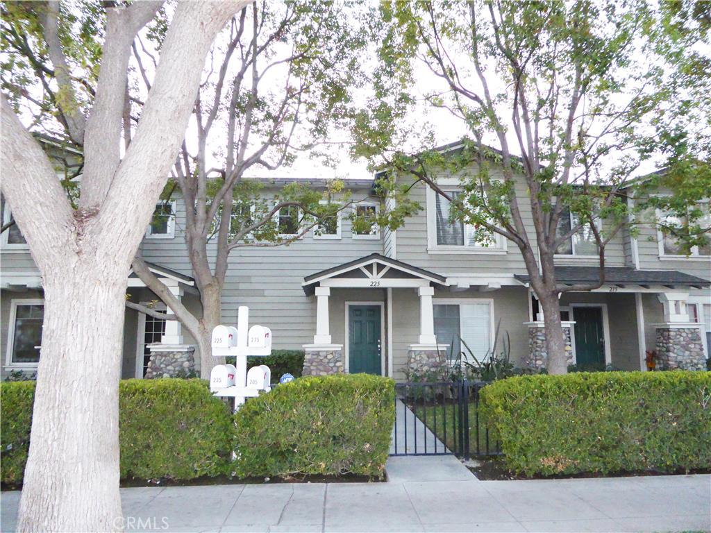 front view with private gate entrance. - 225 S Olive Street, Anaheim CA 92805 - photo 1
