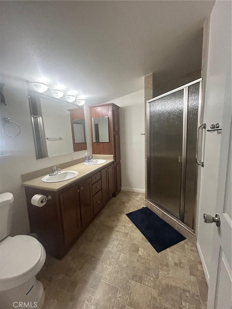 upgraded stoneware in the double sink first bathroom - 2300 Lewis Stree Street, Anaheim CA 92802 - photo 5