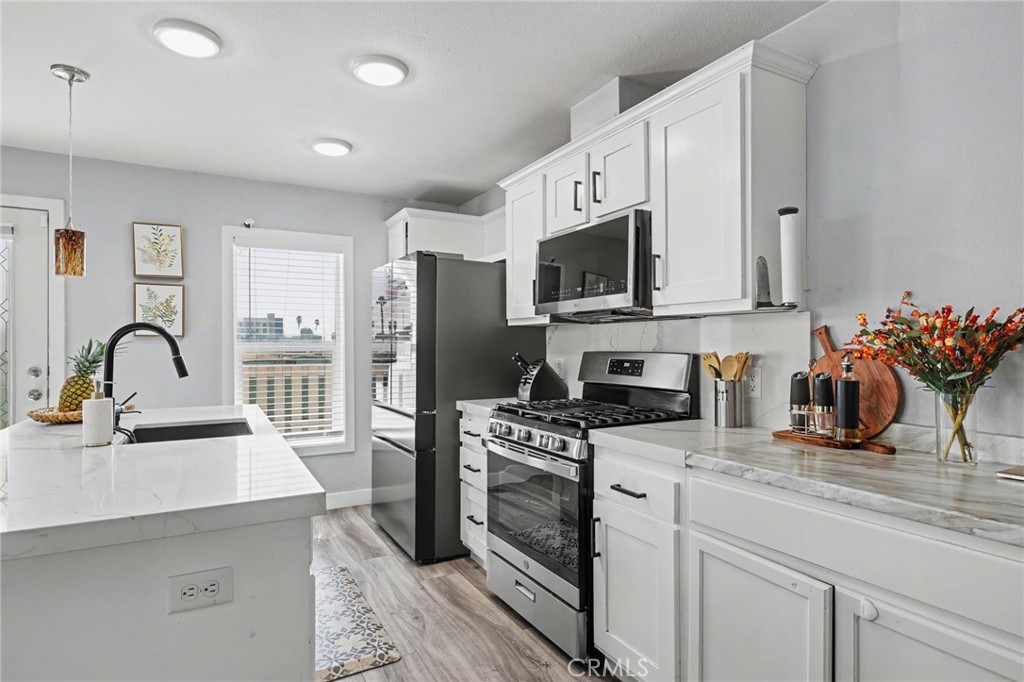 Stainless steel appliances included (excludes: Fridge) - 250 W Midway Drive 2, Anaheim CA 92805 - photo 4