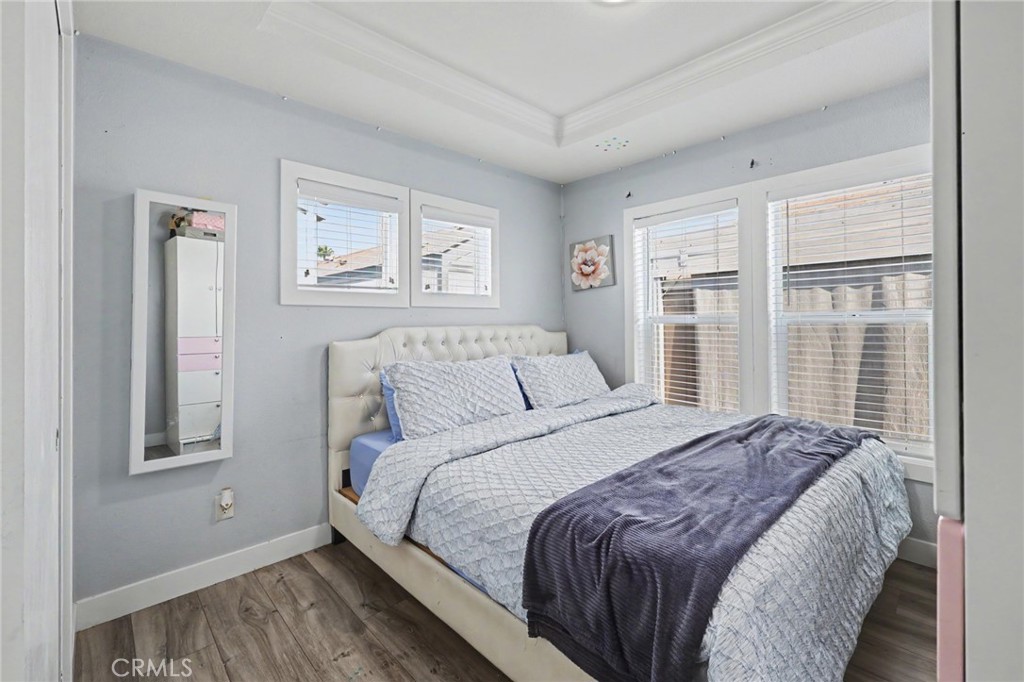 Bright main bedroom with plentiful natural light - 250 W Midway Drive 2, Anaheim CA 92805 - photo 13