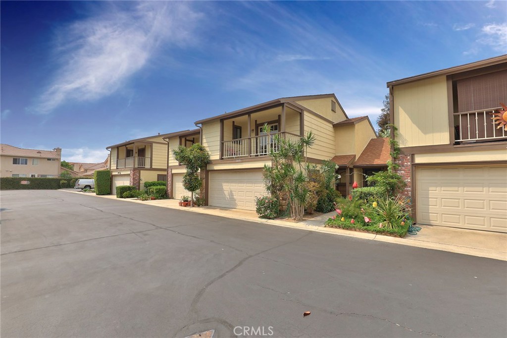 Quiet Interior Location in Gated Community - 2 Car Garage with Direct Access - 2671 W Meadowview Lane, Anaheim CA 92804 - photo 1