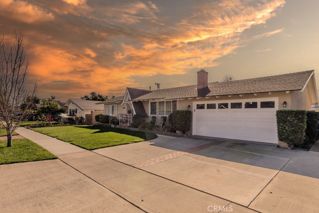 View of the home looking to the southeast. Home faces north. - 2834 W Keys Lane, Anaheim CA 92804 - photo 1