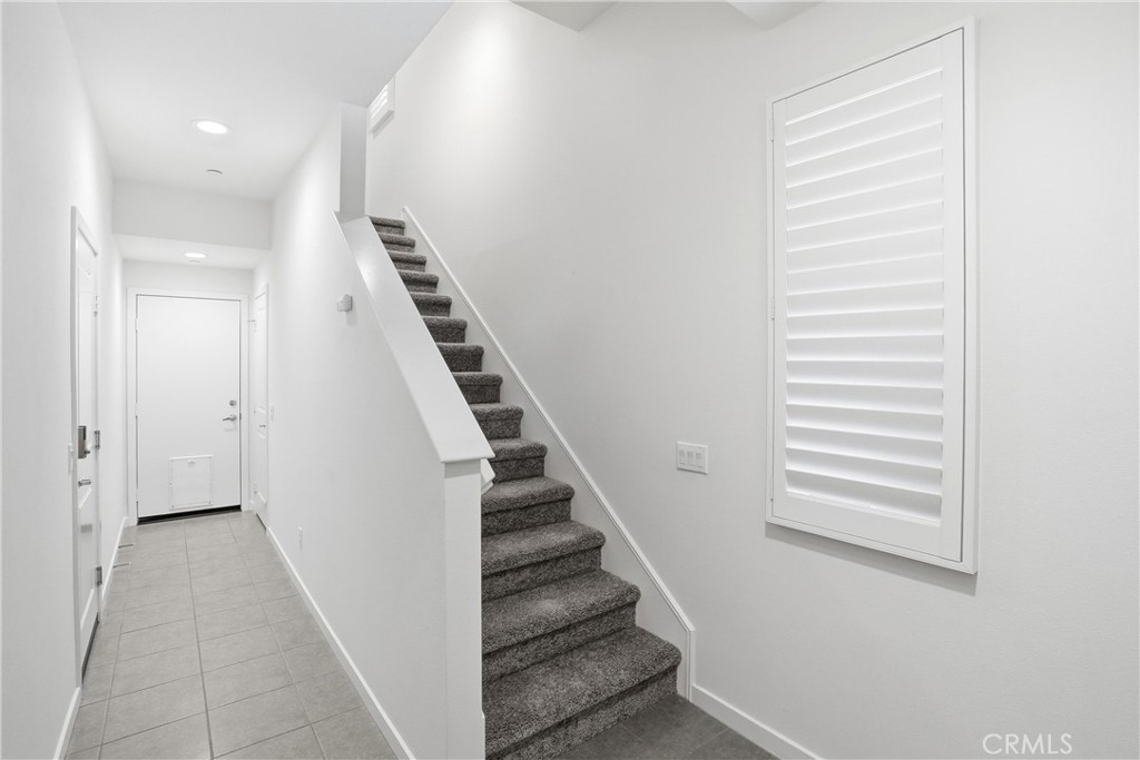 Entry level with direct garage and backyard access - 310 N Bellarose Way, Anaheim CA 92805 - photo 3