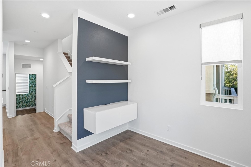 Office/Play Room looking towards laundry room and powder room - 310 N Bellarose Way, Anaheim CA 92805 - photo 16