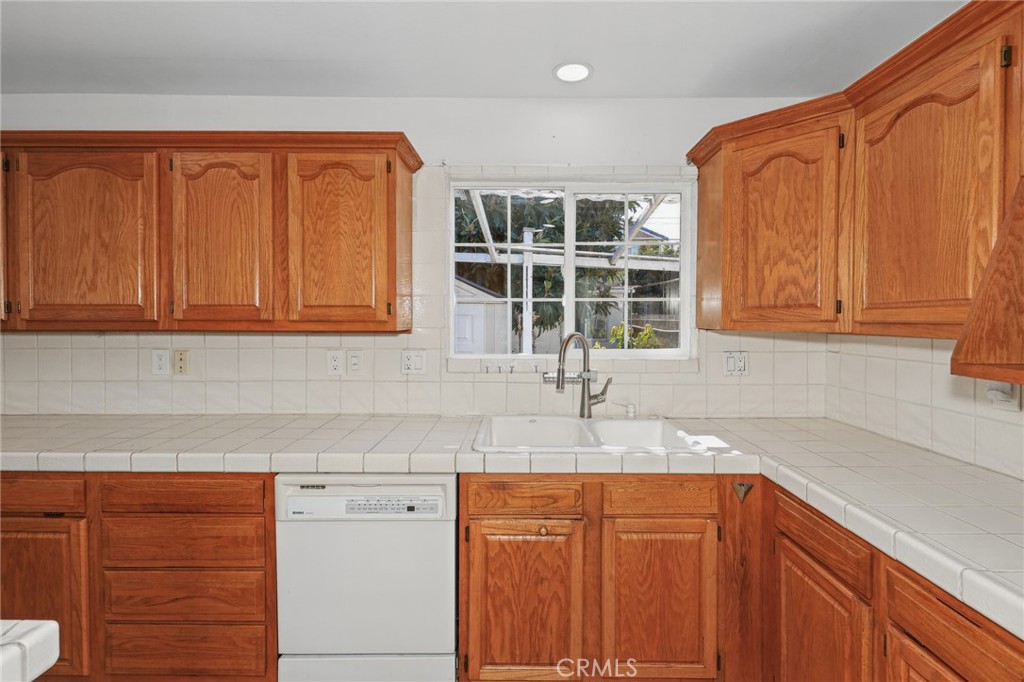 Kitchen toward sink and dishwasher - 3122 W Glen Holly Drive, Anaheim CA 92804 - photo 22