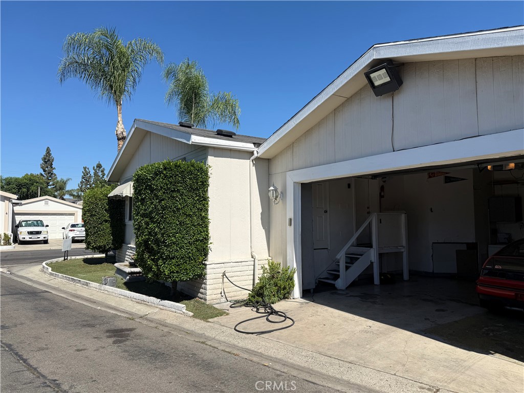 Attached garage - 320 N Park Vista Street 116, Anaheim CA 92806 - photo 5