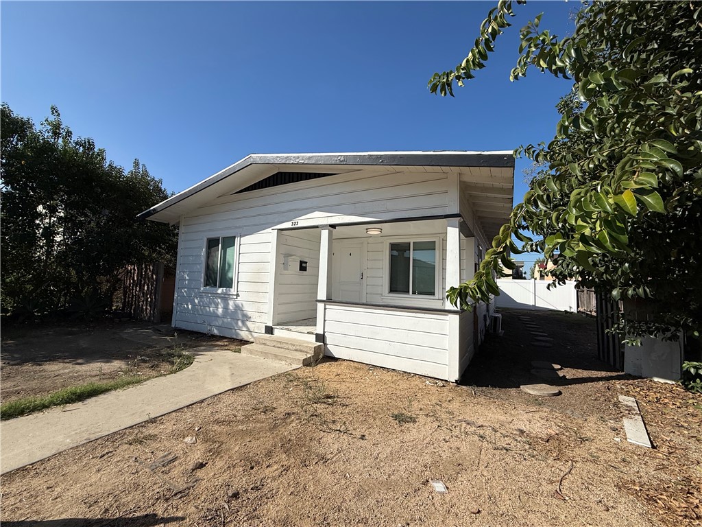 Covered porch - 323 S Kroeger Street, Anaheim CA 92805 - photo 3