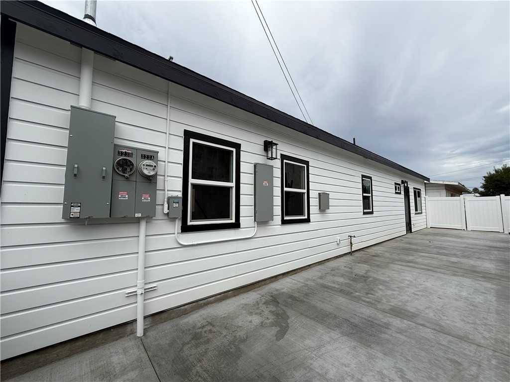 Driveway access from the alley fits 2 cars. - 323 S Kroeger Street, Anaheim CA 92805 - photo 18