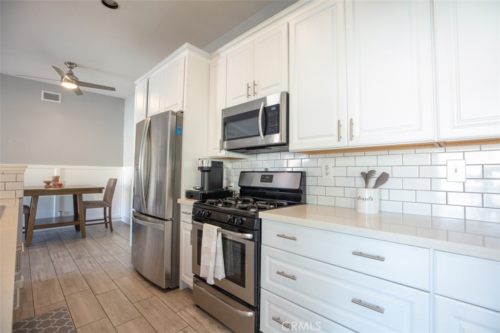Bright beautifully remodeled kitchen - 3520 F W Sweetbay Court, Anaheim CA 92804 - photo 1