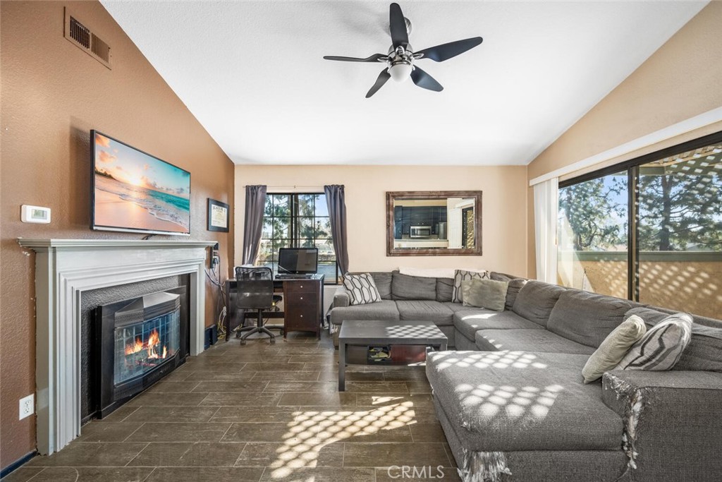 Vaulted ceilings, lots of windows and light in this property - 3525 W Stonepine Lane F, Anaheim CA 92804 - photo 1