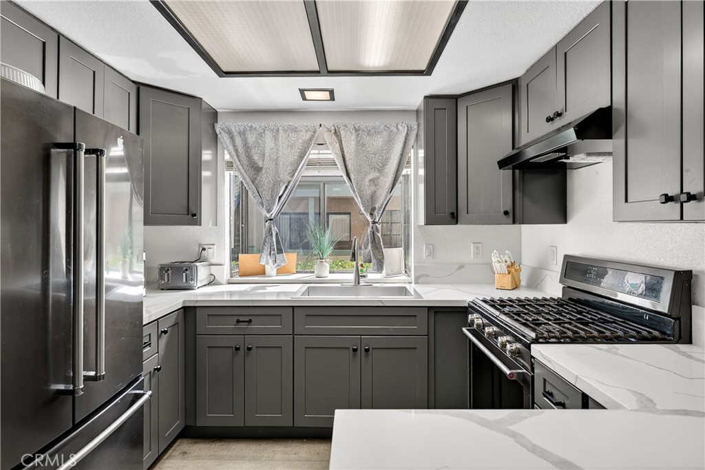 Kitchen View - 3565 Stonepine B, Anaheim CA 92804 - photo 1