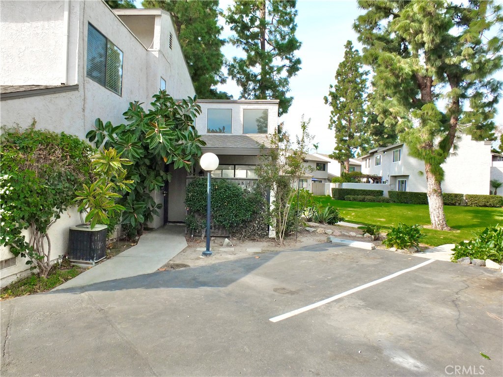 End unit with 2-car garage & lots of guest parking - 389 N Via Milano, Anaheim CA 92806 - photo 1
