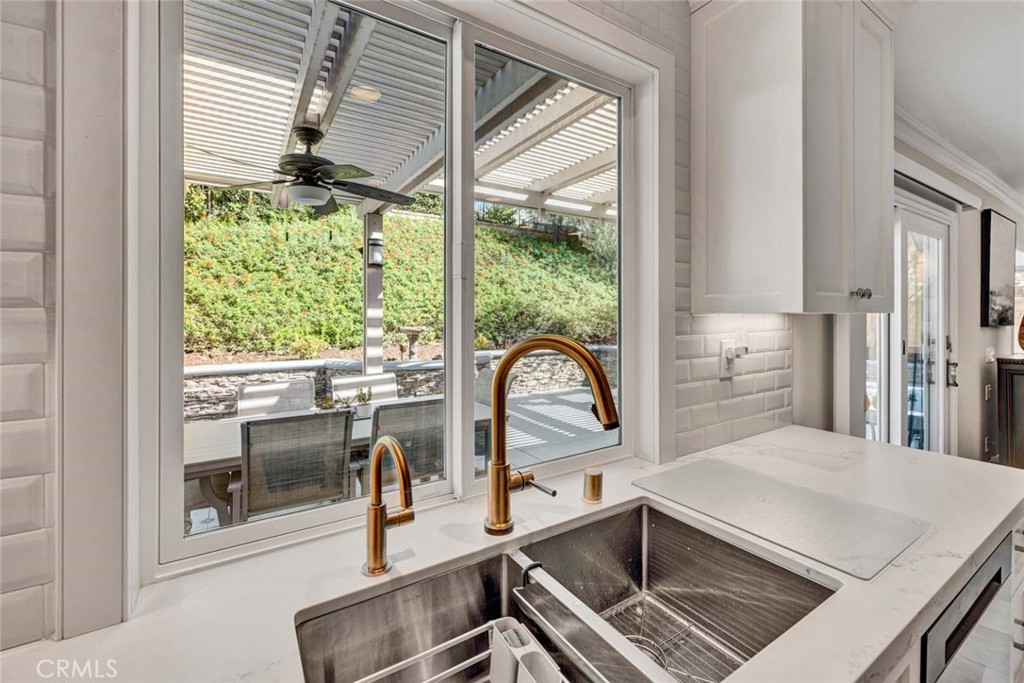 Kitchen view to backyard - 394 S Smokeridge, Anaheim Hills CA 92807 - photo 16