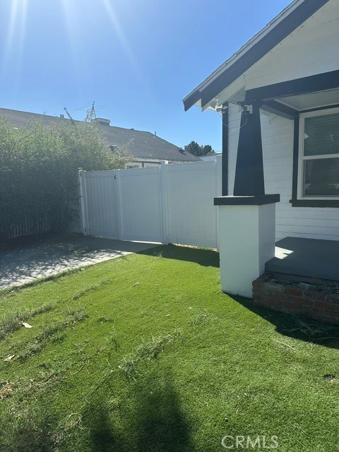 Driveway with Gate Entrance to backyard - 423 S Helena, Anaheim CA 92805 - photo 2