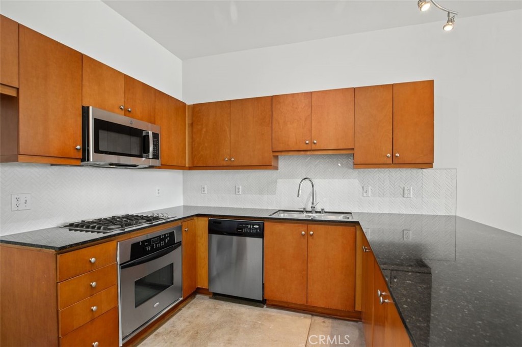 Kitchen area inside front door - 435 W Center Street Promenade 326, Anaheim CA 92805 - photo 1