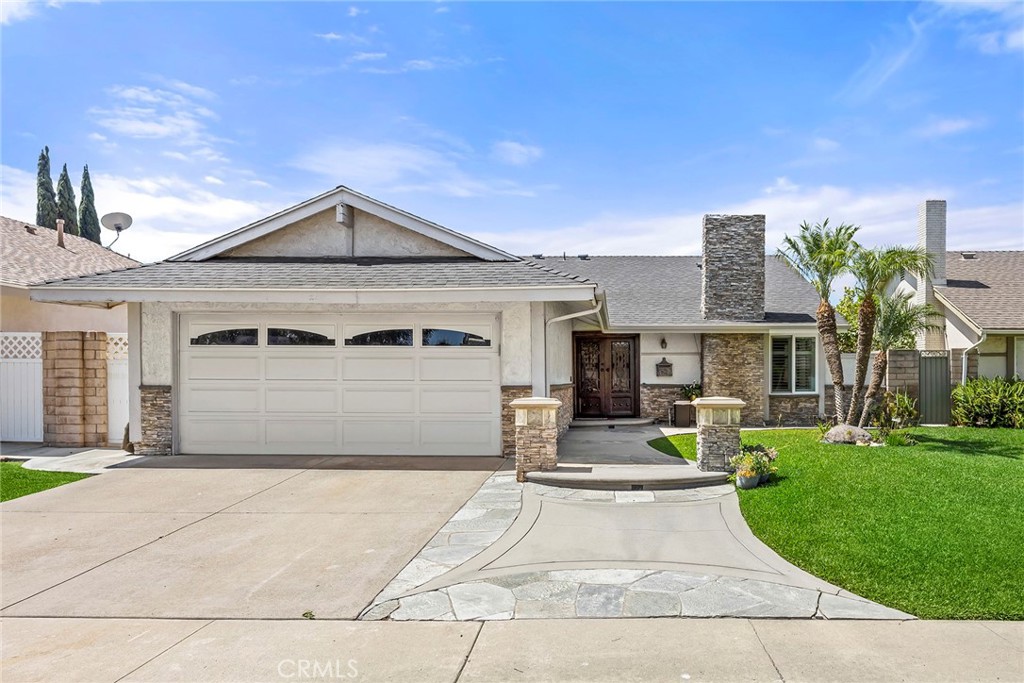Front door faces North - 5034 E Woodwind, Anaheim CA 92807 - photo 1