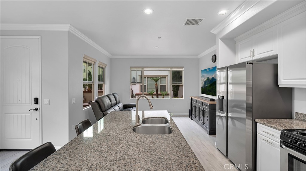 Kitchen Open to Living and Dining Area - 514 S Melrose, Anaheim CA 92805 - photo 5
