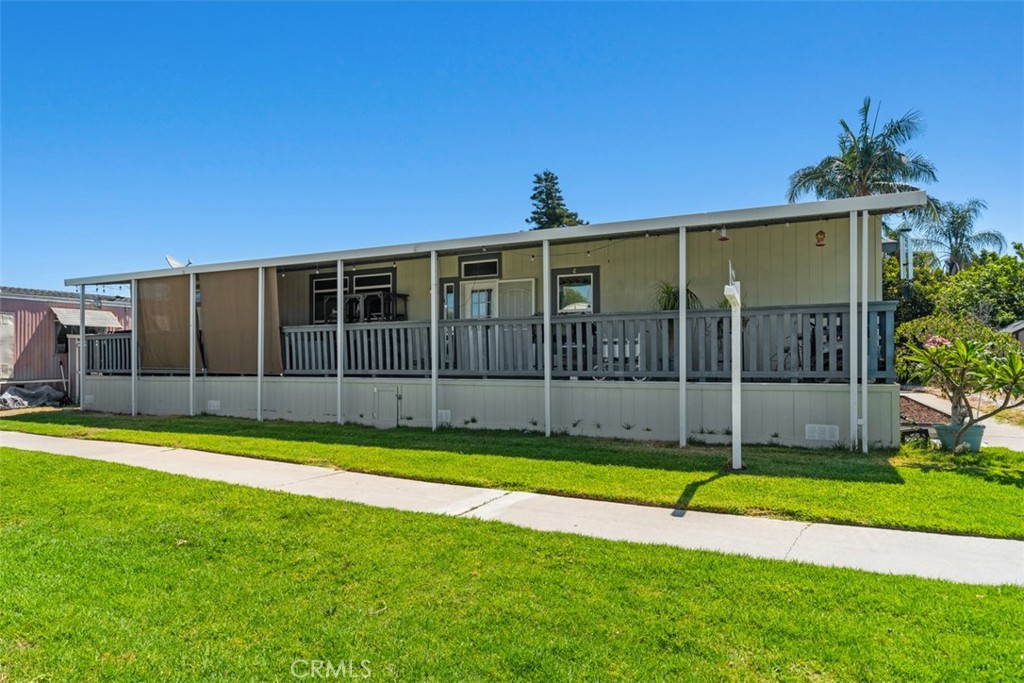 Covered Front Porch - 60' x 8' - 5815 La Palma Ave 304, Anaheim CA 92807 - photo 2