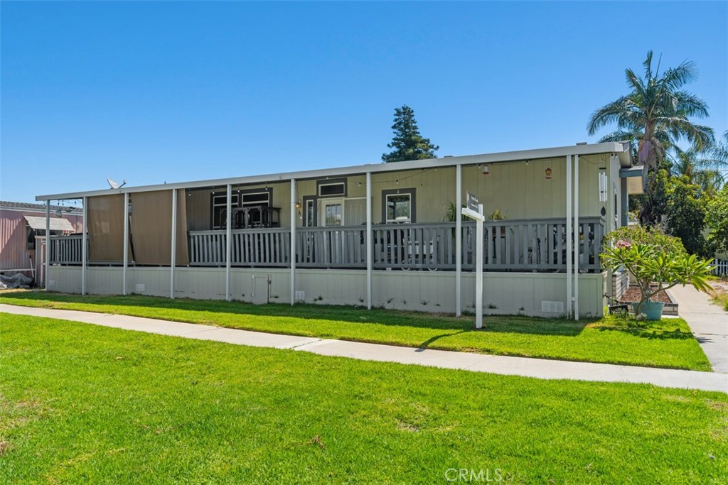 Covered Front Porch - 60' x 8' | green common grounds - 5815 La Palma Ave 304, Anaheim CA 92807 - photo 4