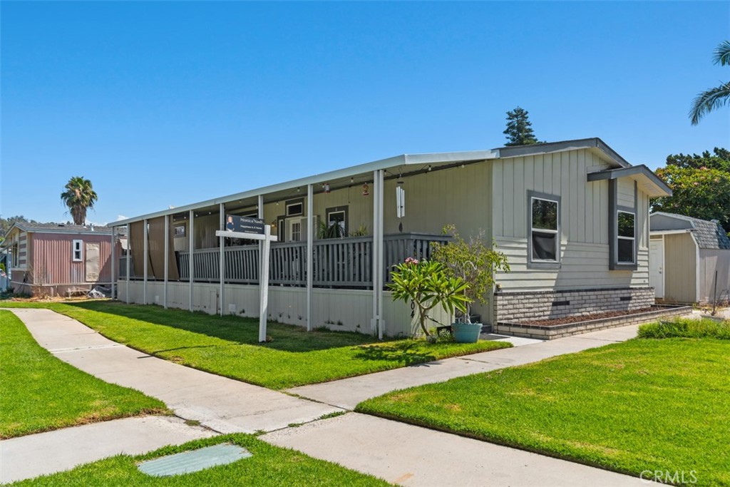 Covered Front Porch - 60' x 8' | green common grounds - 5815 La Palma Ave 304, Anaheim CA 92807 - photo 5