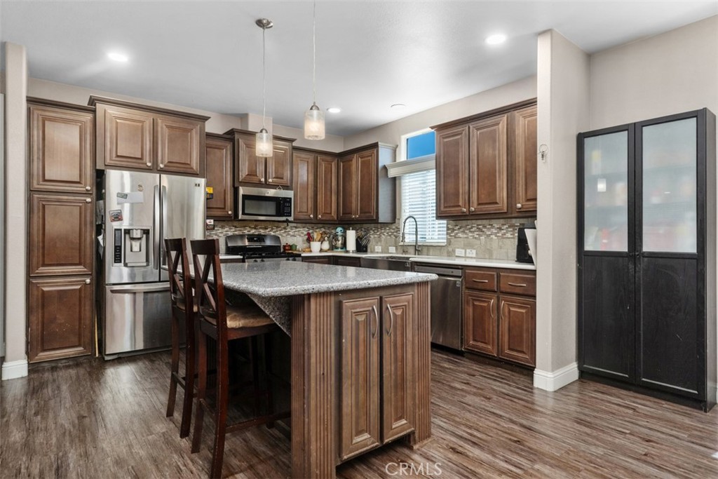 Spacious family room with Chef's Luxury Kitchen - 5815 La Palma Ave 304, Anaheim CA 92807 - photo 8