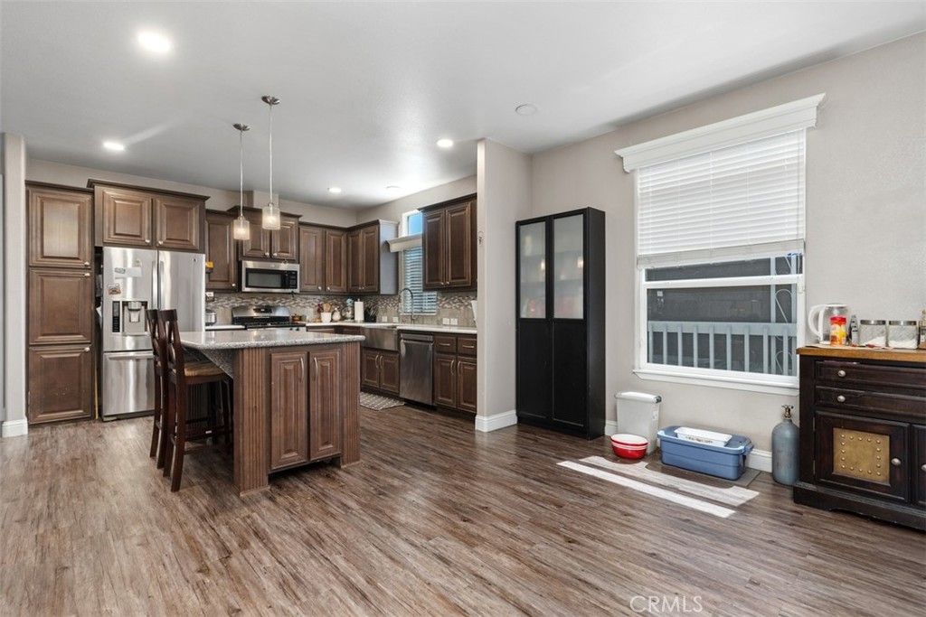 Spacious family room with Chef's Luxury Kitchen - 5815 La Palma Ave 304, Anaheim CA 92807 - photo 14