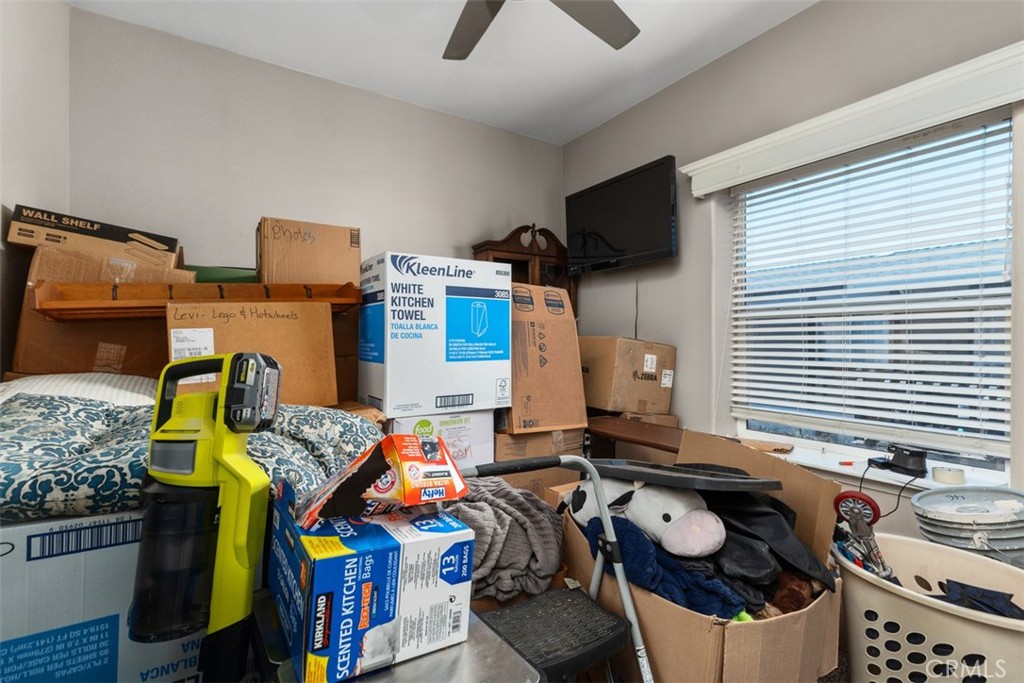 Bedroom 4 | packing boxes to move - 5815 La Palma Ave 304, Anaheim CA 92807 - photo 33