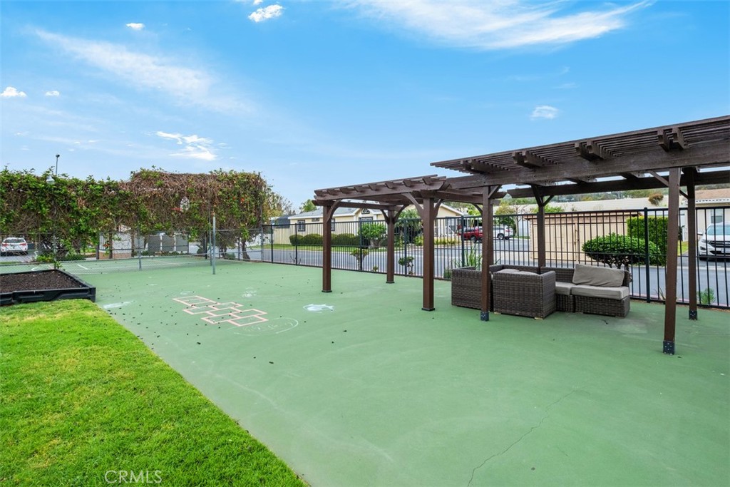 Playground | shade and seating to watch the kids. Hopscotch and grass - 5815 La Palma Ave 304, Anaheim CA 92807 - photo 36
